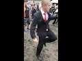Guy looks out of place wearing a suit to a festival, until the beat drops | CONTENTbible
