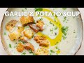Creamy garlic soup with crispy garlicky croutons