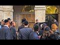 GET OUT!! POLICE EJECT huge group who were MOCKING The King's Guard at Horse Guards!