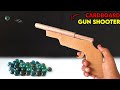 how to make cardboard gun powered by rubberband | Marble shooting gun | easy shooting toy