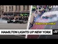 Lewis Hamilton tearing up 5th Avenue, Empire State Building with the "Donuts" from his W12 Mercedes