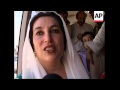 WRAP Bhutto arrives  back after eight years' exile; comments; crowds ADDS more