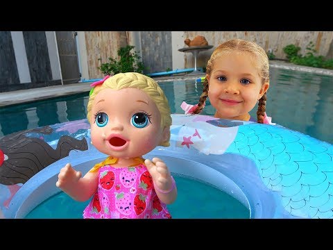 Diana and her super fun day with Baby Doll