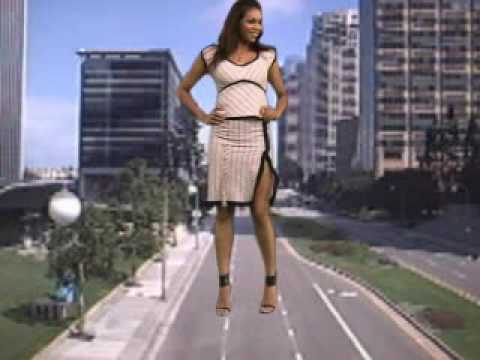 Mini giantess walking around building advert pictures