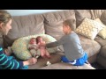 Brother meets triplet siblings for the first time! 2 in the video, 3rd came home two days later.