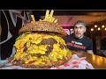 TRYING TO BEAT A 12LB BURGER CHALLENGE WITH 100 PIECES OF CHEESE | Joel Hansen
