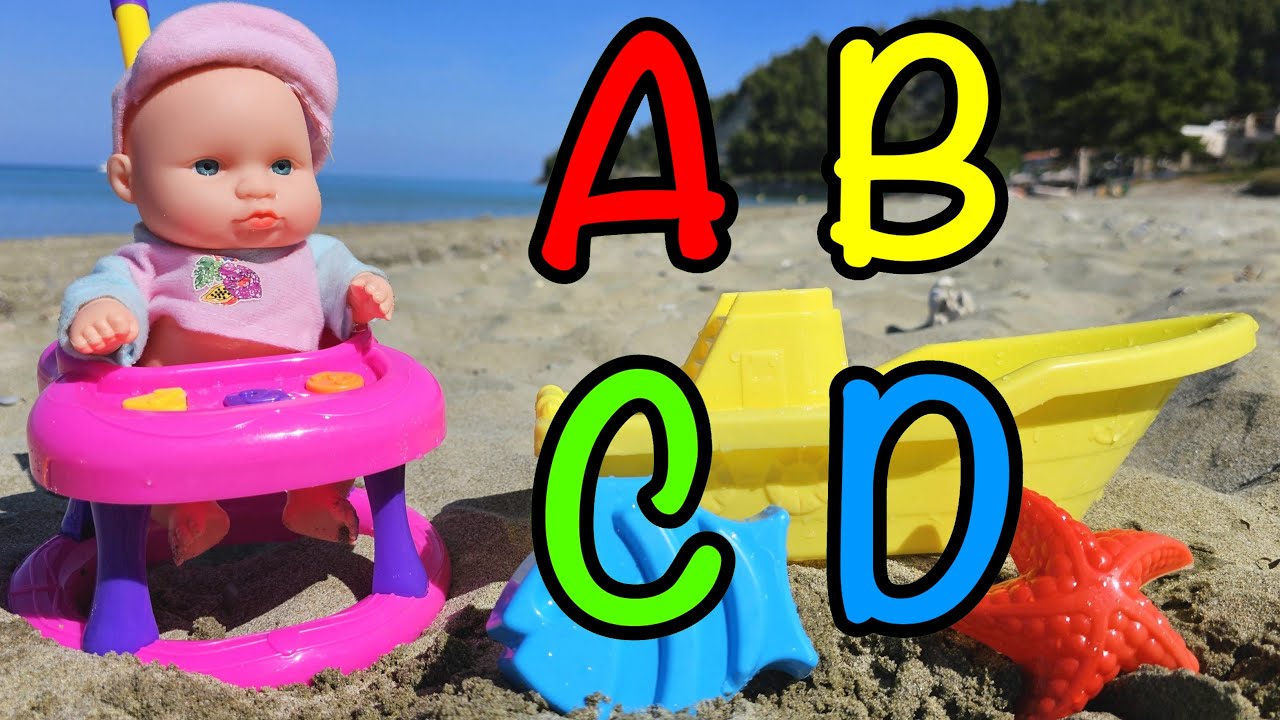 Baby doll playing with ABC Song for kids