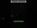 Incredible orange lightning caught on camera