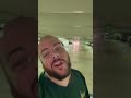man sings his heart out in parking lot