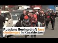 Russians fleeing draft face challenges in Kazakhstan