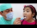 La canción del dentista | Jannie finge jugar al dentista | Rima Infantil Cancion infantil para niños