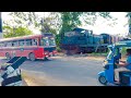 Very Fast GoVeRnMenT BUS stuck ON railroad crossing Srilanka ( FORTUNATELY its SLOW Engine Train)