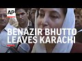 Benazir Bhutto leaves Karachi, arrives at father's tomb AP pix, Bhutto sot