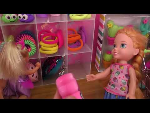 Shopping Elsa and Anna toddlers buy from Claire s store Barbie