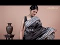 This black tussar silk saree is a perfect party wear