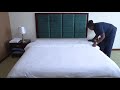 Housekeeping - Level 3 - Making the bed and dusting the guest room 2 of 3