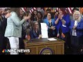Arizona governor signs repeal of 1864 abortion ban