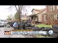 Community rallies to clean up dumped tires in their neighborhood