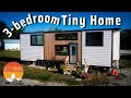 Living her best life in stunning Tiny House with 3 standing bedrooms!