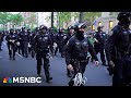 NYPD officers in full riot gear descend on Columbia University campus to clear protesters