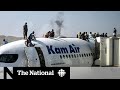 Desperate Afghans flock to Kabul airport in attempts to flee