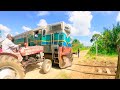 OLD man on Tractor almost hit the HUGE train on railroad crossing | Srilanka Railroad Crossing