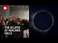 Total eclipse peeks through clouds at Niagara Falls