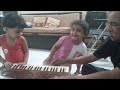 Little Girls Playing And Singing Natural Scale