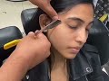 Woman face shave in Barbershop with Razor