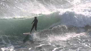Surfer Drops in on Bodyboarder