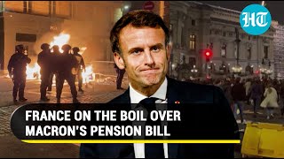 France burns as Macron Govt survives no-confidence vote; Pension bill stir intensifies | Watch