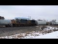 csx 3463 leads long manifest over hill around the curve mid csx 7015 dp w 146 cars 02 08 25