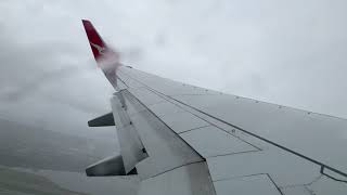 Wet and Windy Takeoff at Sydney International Airport