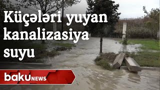 Xırdalan küçələrini yuyan kanalizasiya suyu