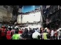 Rescuers find 14 bodies after building collapse