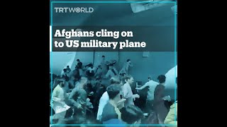 Afghans cling on to US Air Force plane