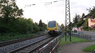 Go-Ahead Deutsche Bahn Inter Regio Express IRE train passing train station near Karlsruhe, Germany