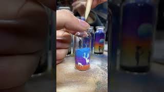 How do you layer sand in a bottle?