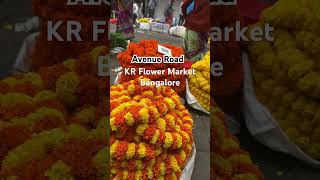 The KR Flower Market with busy chatter, quick-footed shop #bangalore #flowers  #market