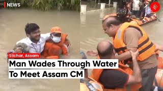 This Resident Waded Through Knee-Deep Water To Meet Assam CM Himanta Biswa Sarma