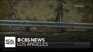 Watch: Man throws rocks onto 110 Freeway in South LA