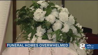 Tampa funeral director buries two of his own friends on same day, no funerals available for two week