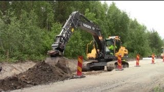 Volvo EC250DL with Oilquick OQ70 @ Roadwork