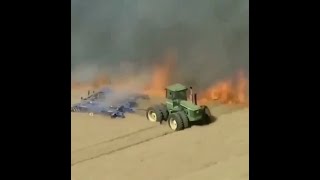 Insane racing a tractor vs fire