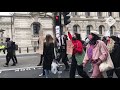 hundreds of protesters march to parliament square in london against harassment of women