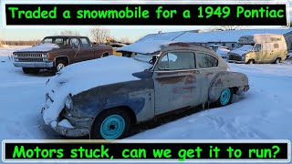 Traded a snowmobile for an abandoned 1949 Pontiac with a stuck motor will it start?