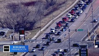 A convoy of cars has traveled to Burnsville to honor the fallen first responders