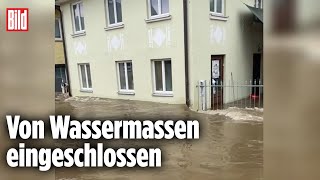 BAYERN: Polizei rettet Personen aus Hochwasser