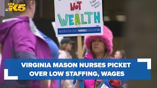 Nurses at Virginia Mason picket over workplace violence, low staffing and wages