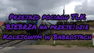 Przejazd pociągu TLK BIEBRZA na przejeździe kolejowym w Babrostach | SU160-003 | RP1 | Linia nr 219